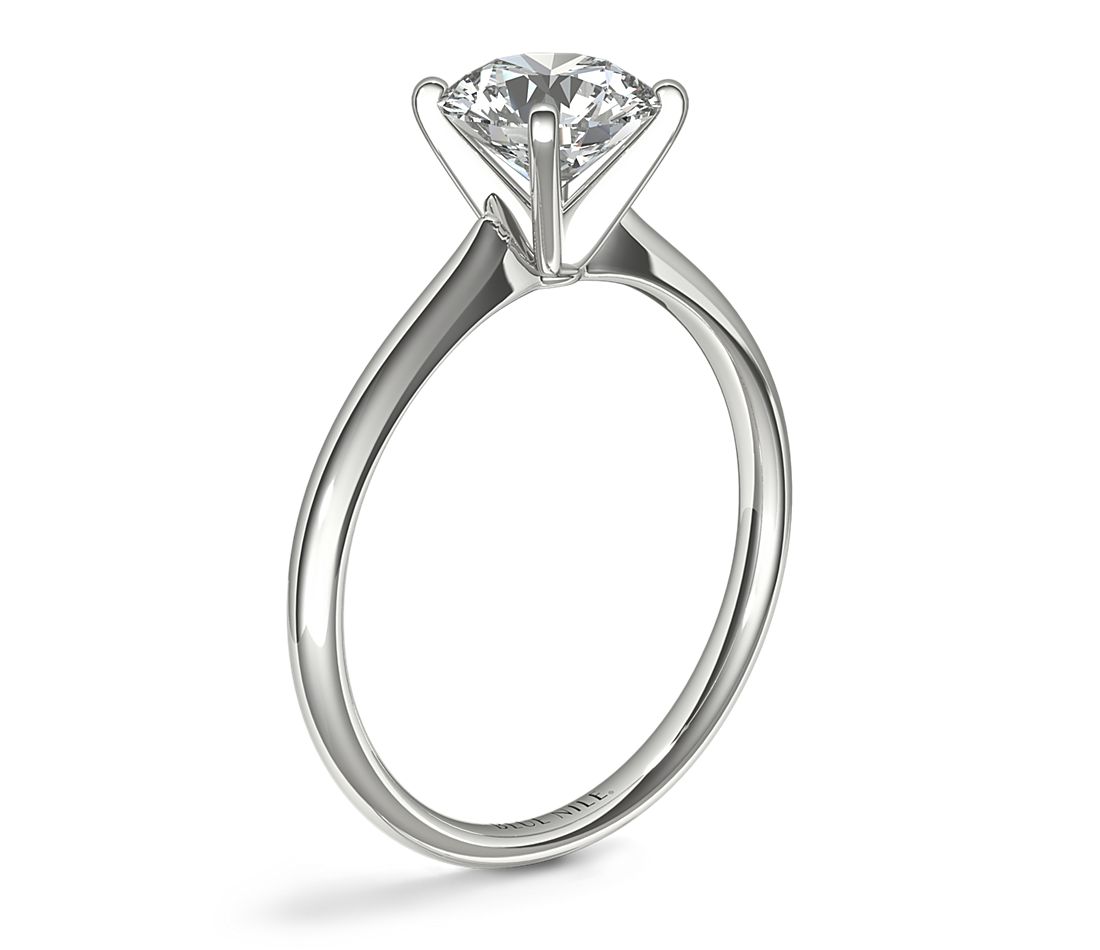 Petite Solitaire Engagement Ring in Platinum