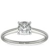 Petite Solitaire Engagement Ring in Platinum